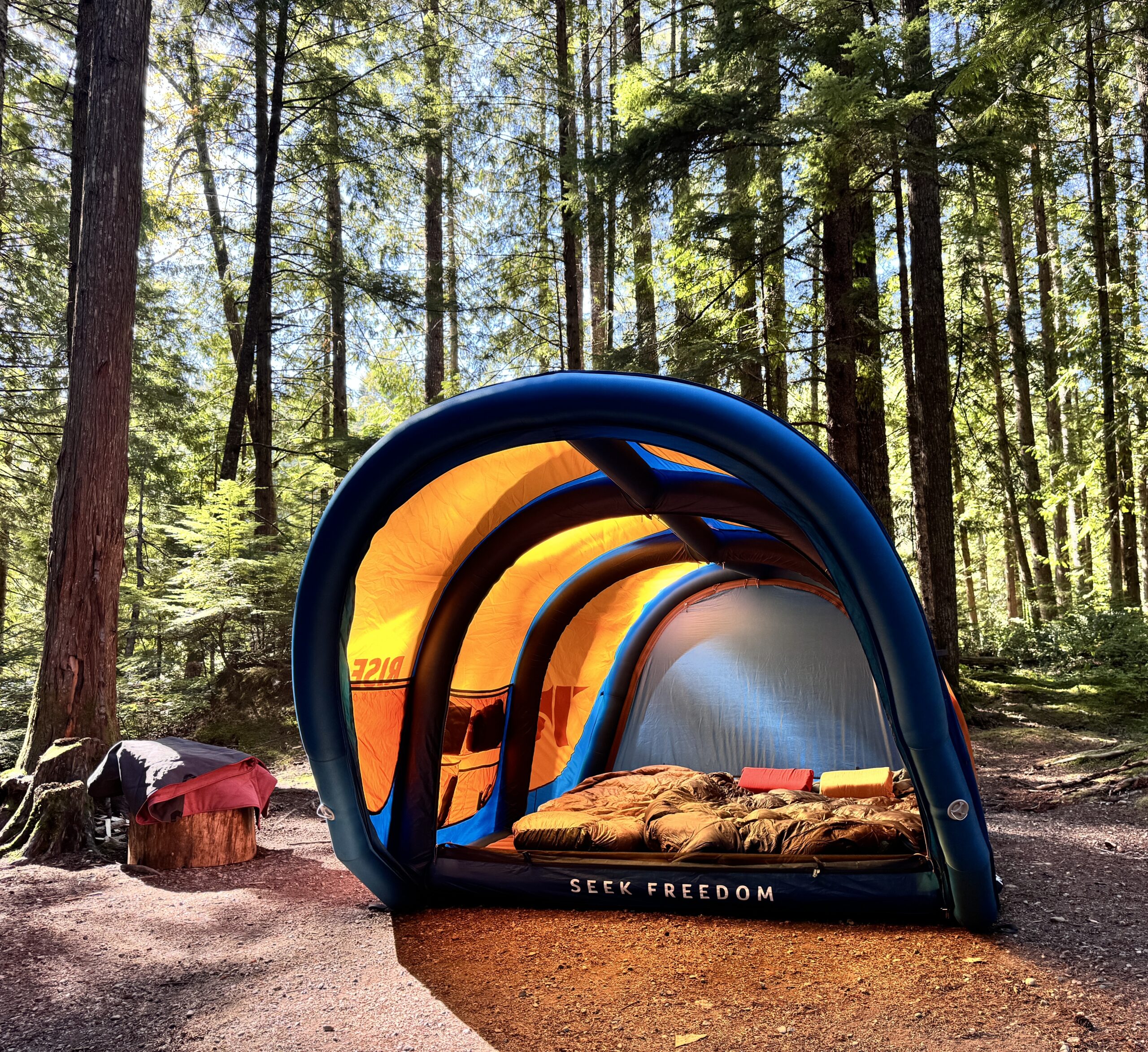 An inflatable tent, the RISE AirNEST, in forest.